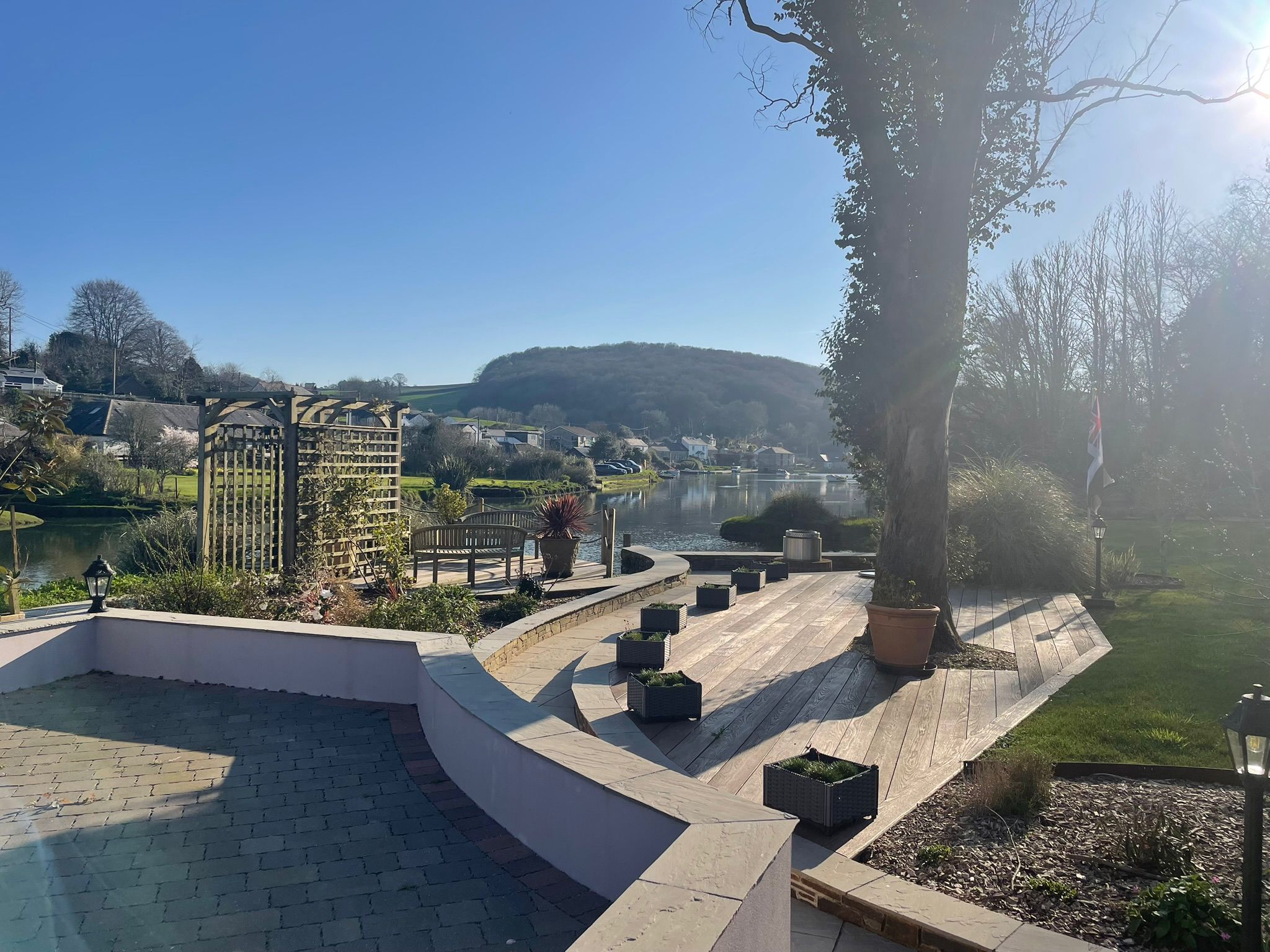 Sunlit riverside terrace, Lostwithiel