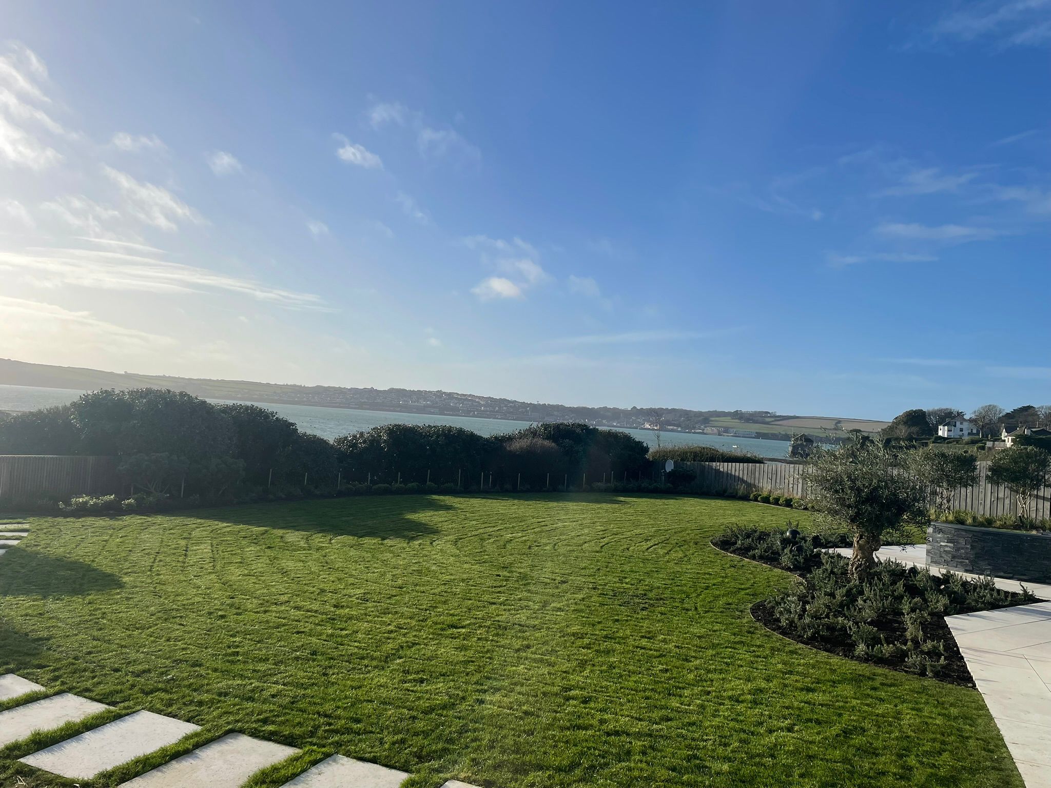 Striped coastal lawn overlooking the estuary, Rock